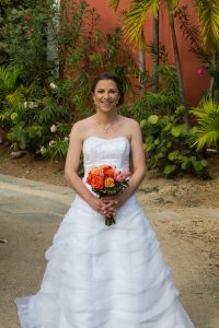 beautiful flowers and gorgeous bride ready for wedding photographs